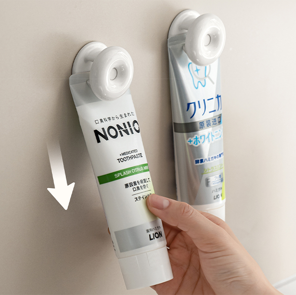壁掛け式の歯磨き粉クリップ